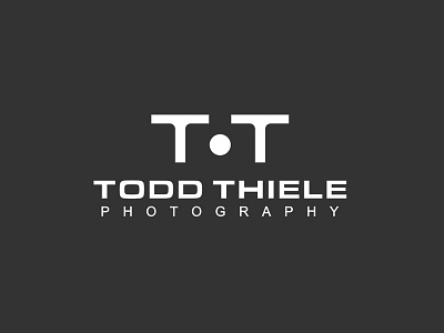 Todd Theile camera logo logomotive photographer t