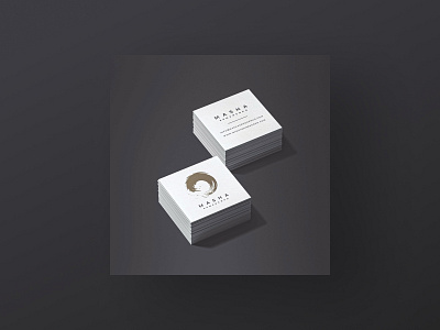 Gold logo on square minimalist business cards