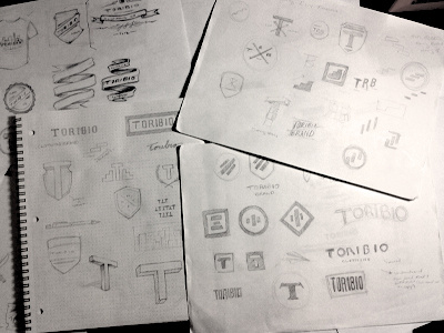 Early concept sketches brand concept logo mark paper shield sketch symbol t toribio