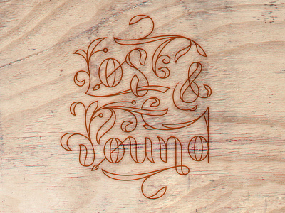 Lost & Found on wood. lettering ornaments traditional type typography vintage
