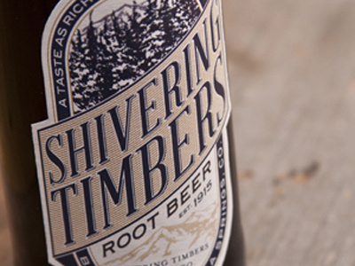 Shivering Timbers Root Beer alchohol beer beverage bottle drink illustration label mountains packaging root beer
