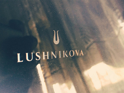 Lushnikova logo branding design graphic design identity logo sign symbol typography vector