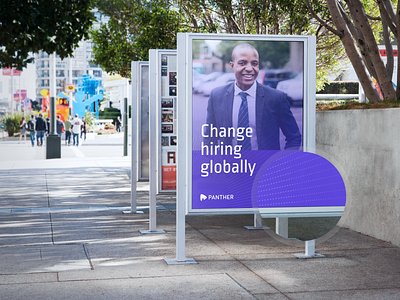 Signage advertising billboard branding global hiring identity logo marketing outdoor panther purple sign signage texture type
