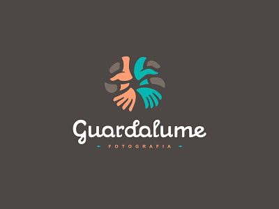 Guardalume Final Logo brazil hands logo lumen photo photography script shutter spiral typography