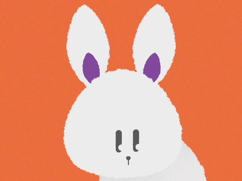 Small rabbit in love with carrots