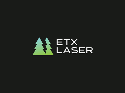 East Texas Laser Logo electric laser lightning logo negative space pine tree