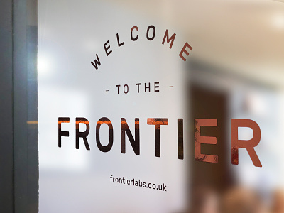 Frontier Labs office window vinyl artwork brand identity branding frontier graphic design logo office start up vinyl window artwork