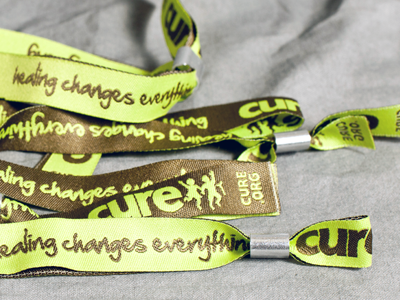 CURE Schwag bracelets brown cure.org fabric lime schwag