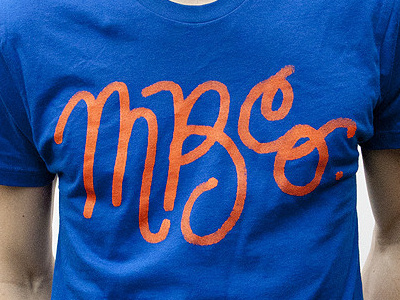 MBCO. Script clothing hand lettering make believe tee type