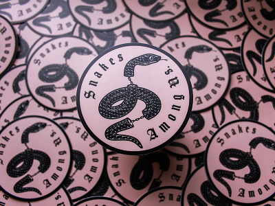 Snakes Among Us badgedesign branding graphic design illustration illustrator lettering logo merch design snakes sticker sticker design typography vector