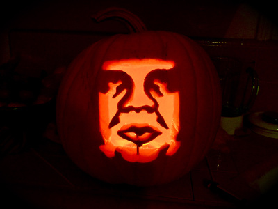 Happy Halloween carving dan kuhlken dkng giant halloween obey pumpkin shepard fairey