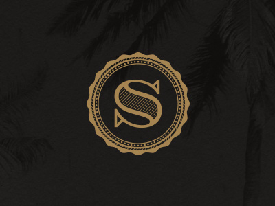 Salvador Logo gold letter logo palms s