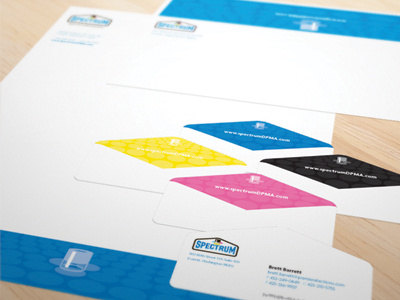 Spectrum Stationery business cards cards cmyk die cut digital printing envelope identity application letterhead logo logo design mail automation pattern printing stationery visual identity