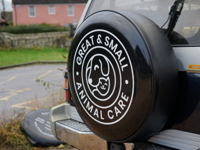 Great & Small Animal Care: Logo & Wheel cover.