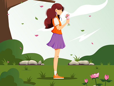 Girl holding a bouquet of flower in the garden