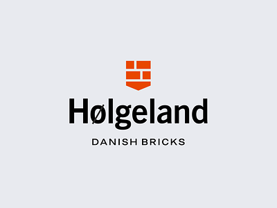 Holgeland brand identity brandmark brick building construction denmark emblem family heraldic logo logodesign manufacture mark real estate shield sign storozhevantosha structure symbol