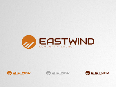 Eastwind Community branding church circle community east eastwind enclosure grey icon identity initials logo maroon orange shape symbol white space wind