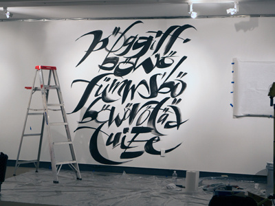 Wall calligraphy with large brush brush calligraphy wall