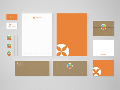 reKind Brand Identity brand business card craft paper envelope identity letterhead orange print stationary stickers