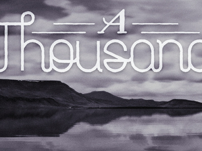Another Thousand lake mountain reflection script swsed thousand typography