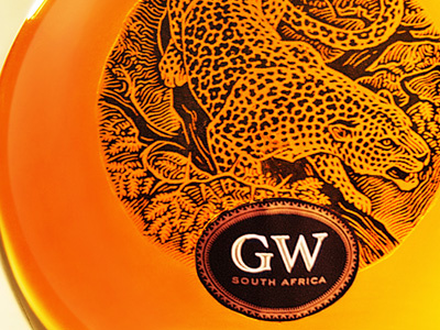 GW Brandy Packaging africa bottle brandy cheetah handmade label leopard lettering lion logo lynx saverglass simon frouws south africa the famous frouws thorn type typography vintage wine wine bottle wine label wine label design woodcut