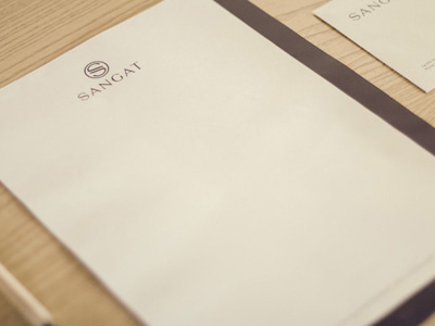 Photo of Stationery | Sangat | Wellness Centre and Spa brand business card envelope invitation letterhead logo design print design sangat spa stamp stationery wellness