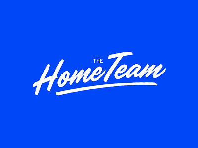 The HomeTeam blue brush handwritten home logo team white wordmark