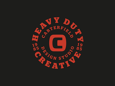 Heavy Duty Creative Badge 1985 badge badge logo black circle circle logo circle type logo promo red tagline typogaphy