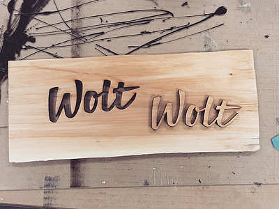 Laser-cut wood logo