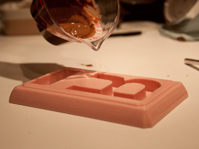 Helvetica R. - in the making chocolate gif handmade helvetica mold r