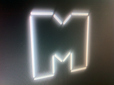 Florescent florescent logo m