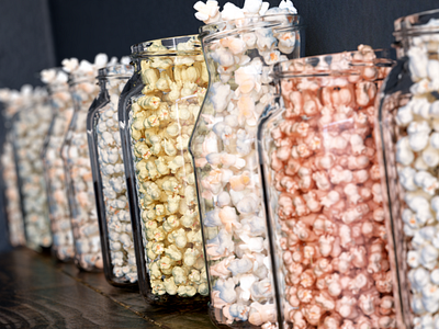 different popcorn in glass jars