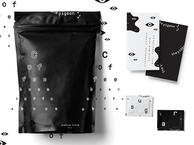 the pigeon pieces black black and white business card coffee eye feather odd packaging poop sugar sydney goldstein the pigeon