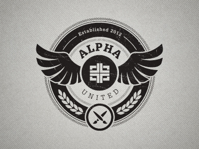 Alpha United Crest circle crest distress emblem logo paintbrush texture wings