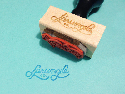 Sprungle Stamp lettering lockup logo script stamp