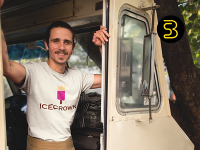 man-smiling-wearing-a-t-shirt-mockup-leaning-against-his-food-truck-door-a20305.png