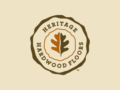 Hertigage Hardwood Floors brown leaf logo wood