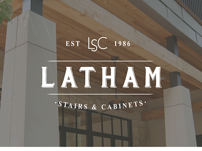 New Design for Latham Stairs & Cabinets. blue brown cabinets homes logo luxury millwork photography stairs woodworking