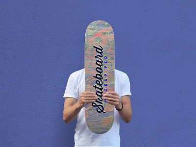 Free Man Holding Skateboard Mockup PSD
