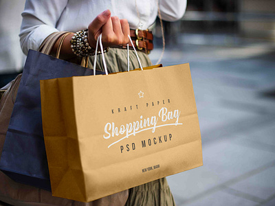 Free Female Holding Kraft Paper Shopping Bag Mockup PSD