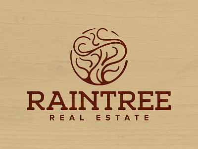 Raintree Real Estate logo real estate tree