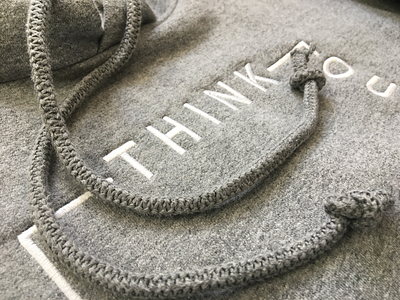 Think Outside The Box Closeup apparel clothing create creativity embroidery fashion grey hoodie minimal photo product photo think thinkoutsidethebox