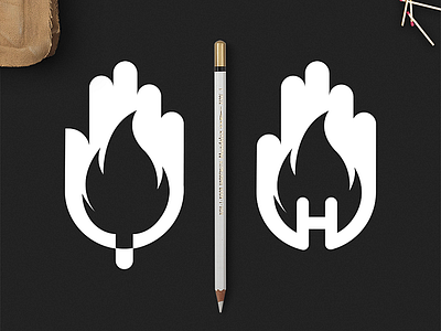 Hand on fire fire hand hand lettering icon logo logodesign logotype negative space