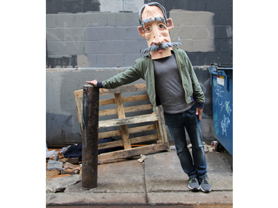 Big Head in Philly alley art face green wall head mask moustache paper mache pennsylvania philadelphia philly sculpture