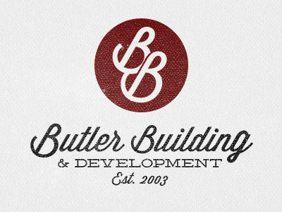 Butler building construction deming logo mark wisdom script