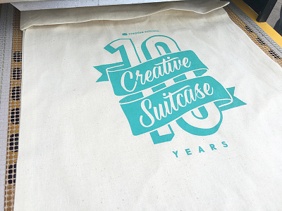Creative Suitcase 10 Year Tote Design brush lettering design lettering screen print script script lettering tote design