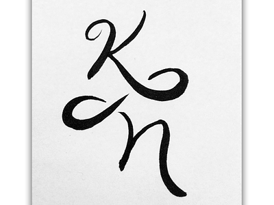 KN "monogram" lettering script