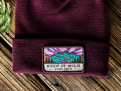 Keep It Wild badge beanie clouds mountain outdoor sunset trees woods coffee