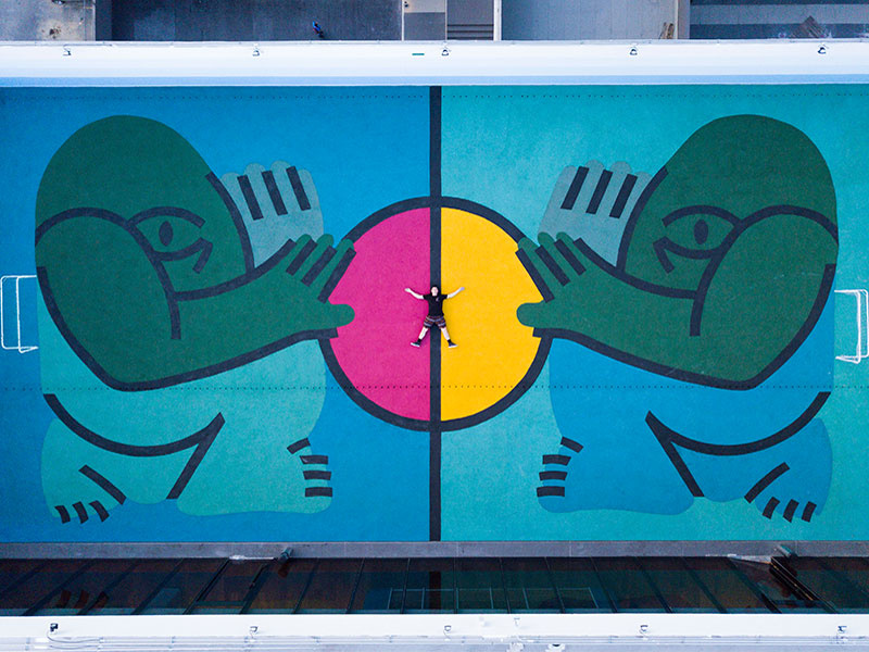 Futbol Court Mural public art large scale symmetrical symmetry colorful muralist mural court futbol