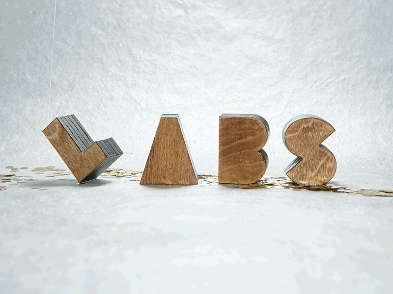 InVision LABS Brand Identity blocks brand identity branding identity identity design letters logo design simple stop motion wood